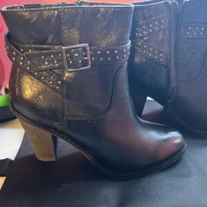 Elegant Black Heeled Boots with Studded Strap